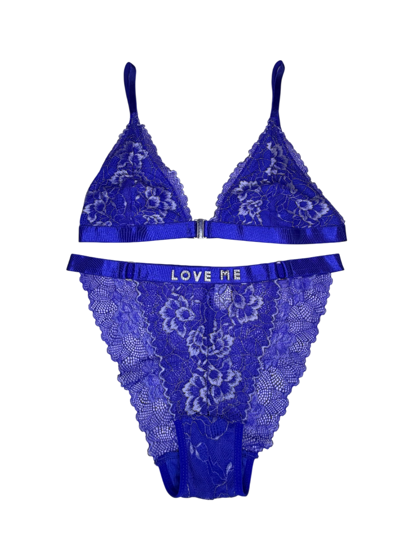 Blue lace lingerie set with 'LOVE ME' waistband on a white background