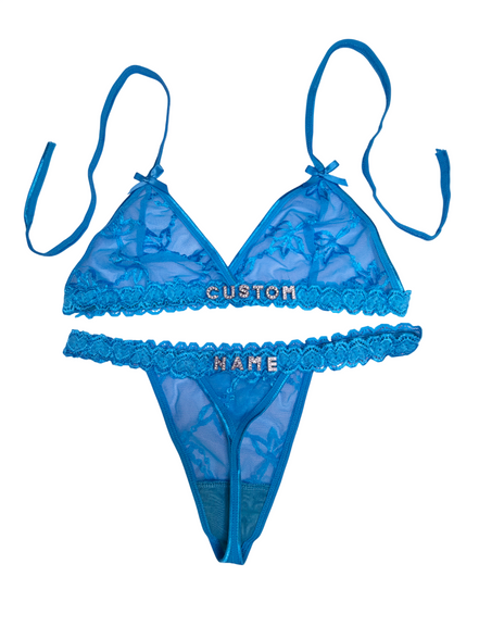 Blue lace lingerie set with 'CUSTOM NAME' embroidery on a white background