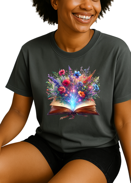 Person wearing a black t-shirt with a colorful floral design on a white background