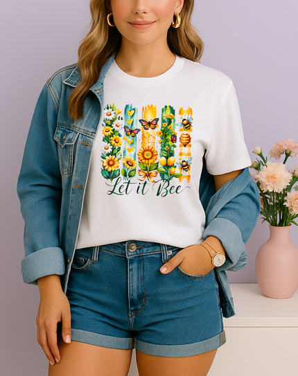 Woman wearing white Let It Bee floral and bee graphic T-shirt, handmade organic cotton nature-inspired fashion tee with flowers and bees