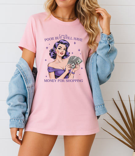 Woman wearing pink retro pin-up graphic T-shirt with I Can Be Poor But Still Have Money for Shopping text, handmade organic cotton fashion tee