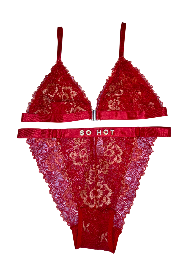 Red lace lingerie set with 'SO HOT' waistband on a white background