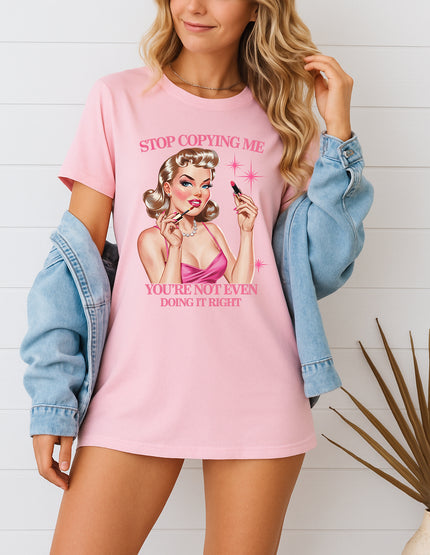 Woman wearing navy Stop Copying Me You’re Not Even Doing It Right retro pin-up graphic T-shirt, handmade organic cotton bold fashion tee
