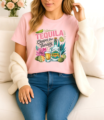 Woman wearing Pink Tequila Cheaper Than Therapy graphic T-shirt with tequila bottle and lime design, handmade organic cotton fun fashion tee