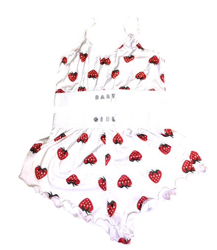 Baby girl outfit with strawberry pattern on a white background