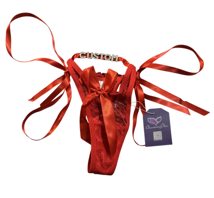 Red lace lingerie set with ribbons and a 'Custom' label, on a white background.