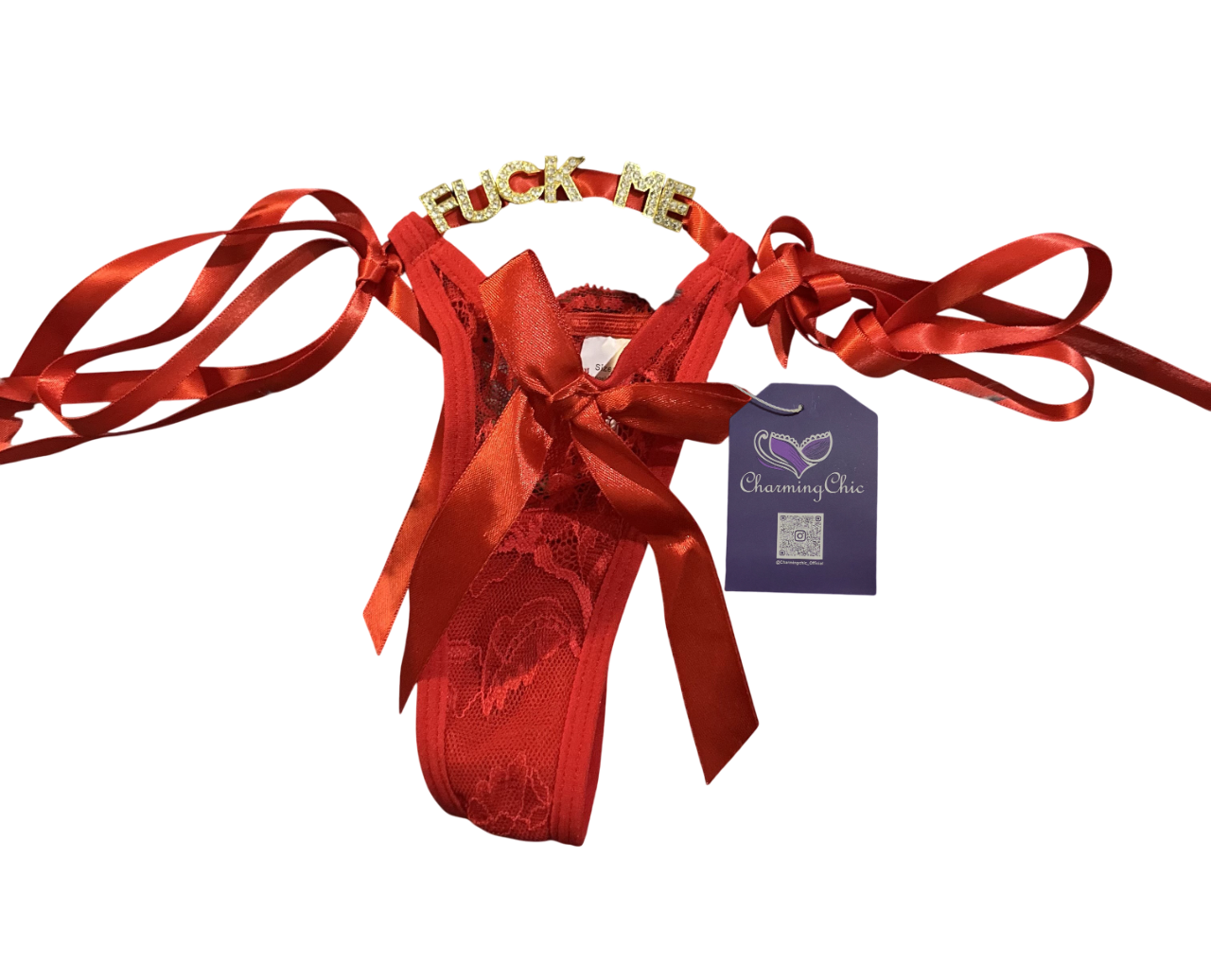 Red ballet slipper with ribbons and a tag on a white background