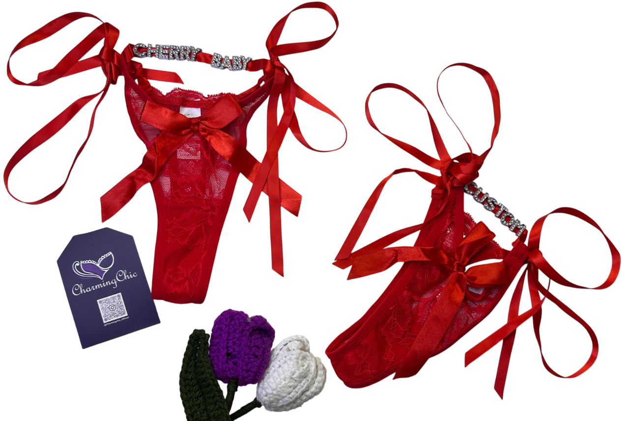 Red lingerie set with ribbons and a purple tag on a white background