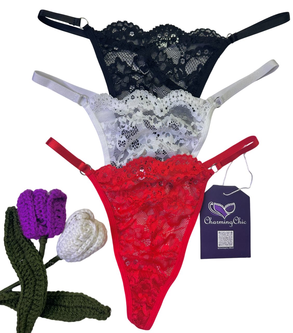 Three lace lingerie pieces in black, white, and red with a 'Charming Chick' tag on a white background.