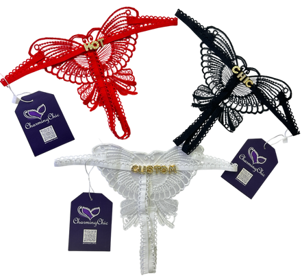 Three butterfly-shaped headbands in red, black, and white with tags on a white background.