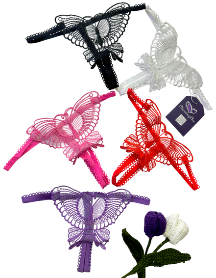 Set of colorful butterfly-shaped hair clips on a white background