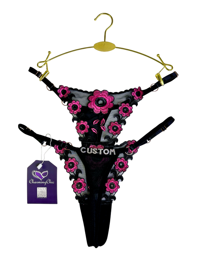 Custom embroidered floral lace thong with personalized name detail in red, white, and black colors.