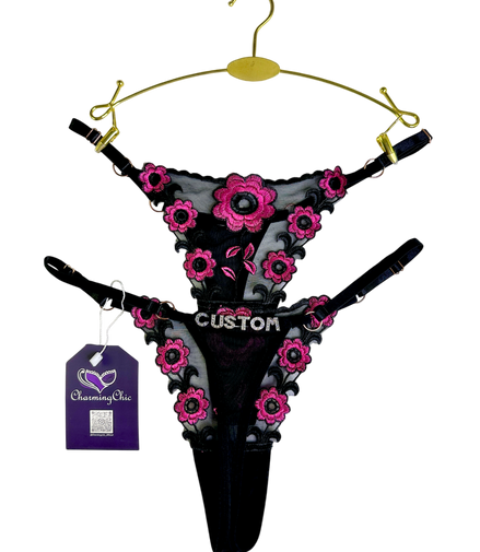 Custom embroidered floral lace thong with personalized name detail in red, white, and black colors.