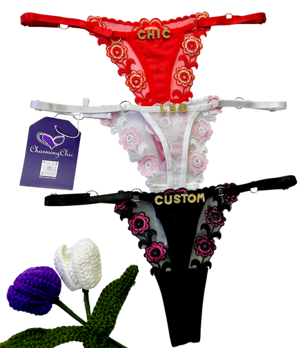 Custom embroidered floral lace thong with personalized name detail in red, white, and black colors.
