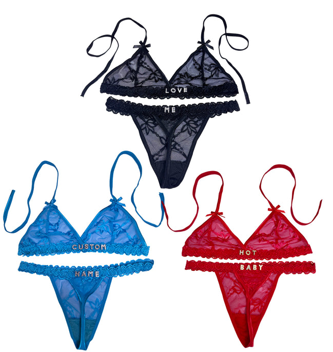 Set of three lace lingerie sets in black, blue, and red with embroidered text on a white background.