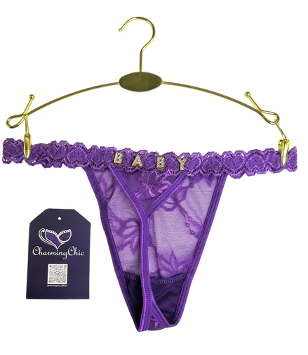 Purple lace thong with 'BABY' lettering on a gold hanger against a white background.